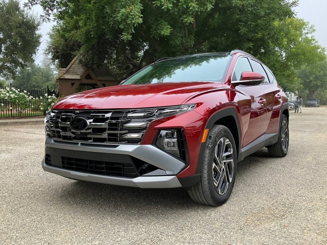 JDP_2025 Hyundai Tucson Hybrid Limited Red Front Quarter View